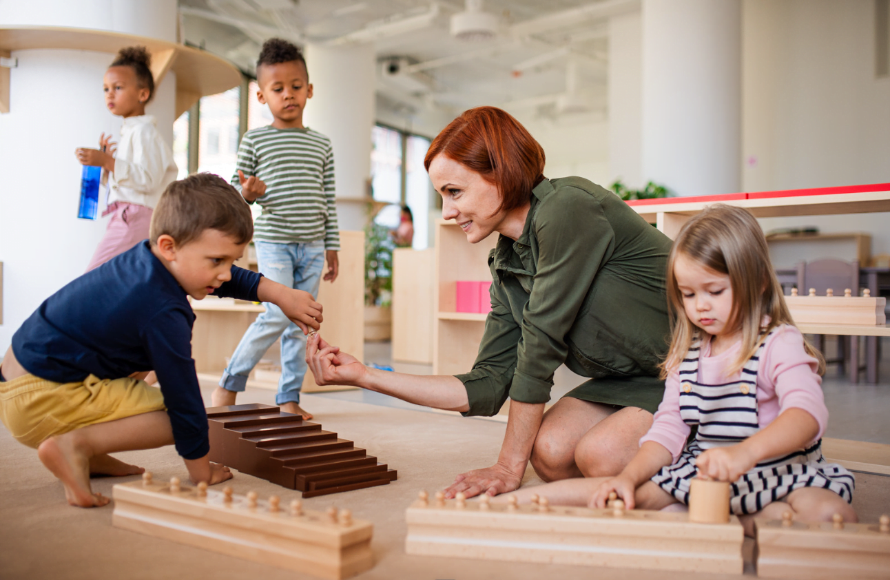 Boy and girl learning through play with montessori tools