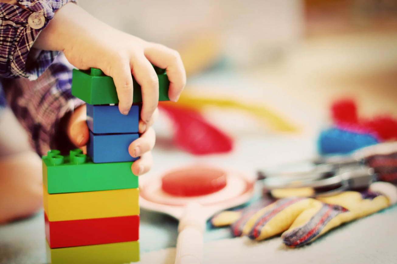 Child learning playing with blocks