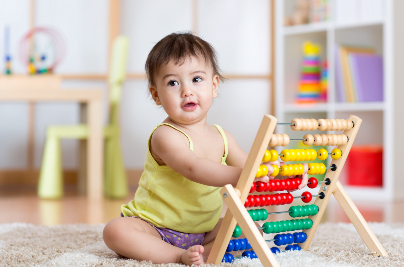 Child playing at kindergarten nursery