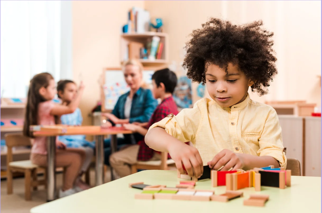 Parent comforting child and discussing kindergarten preparation