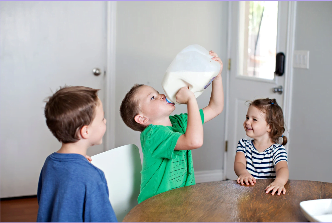 Child eating yoghurt is good for their digestive systems