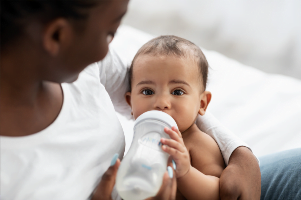 Baby drinking formula milk