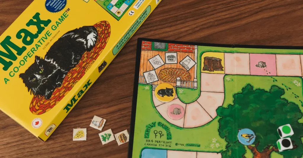 3 year olds playing boards games with animals